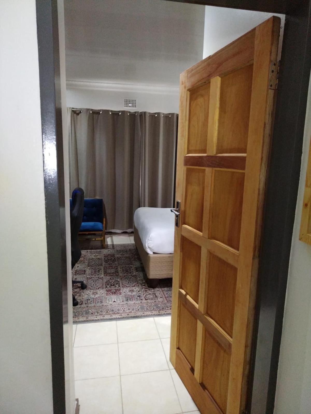 Cheers Guest House Evander Bagian luar foto